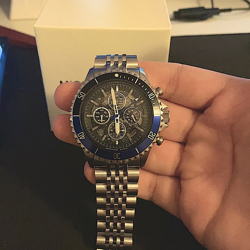 Michael Kors Men’s Bayville automatic silver tone stainless steel watch